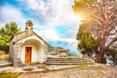 An old baroque church above the mouth of the river Cetina near Omis.  Location:  Gata, Dalmatia, Croatia, Europeの写真素材