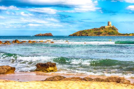 Ancient Spanish tower of Coltellazzo of Saint Efisio lighthouse at Nora archeological site . Location:  Nora, Pula, Sardinia, Italy Europeの写真素材