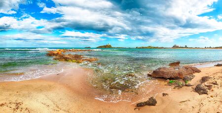 Ancient Spanish tower of Coltellazzo of Saint Efisio lighthouse at Nora archeological site . Location:  Nora, Pula, Sardinia, Italy Europeの写真素材