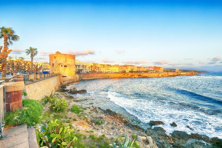 Gorgeous evening cityscape of historical part of Alghero town. Fantastic  Mediterranean seascape. Location:  Alghero, Province of Sassari, Italy, Europeの写真素材