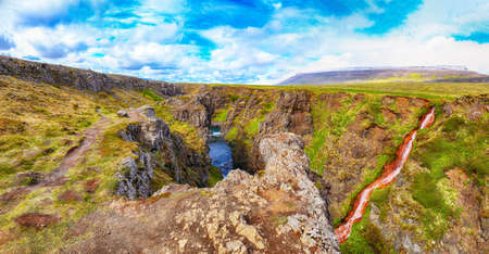 Spectacular view of  Kolugljufur canyon and Kolufossar falls. Kolugljufur gorge is located on river Vididalsa.  Location: Kolufossar waterfall, Vestur-Hunavatnssysla, Iceland, Europeの写真素材