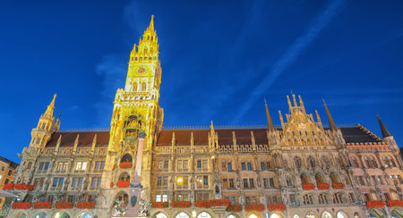 Fantastic night view of facade of Gothic Rathaus or Town Hall of Munich and famous clock tower on Marienplatz. Location: Munich, Bavaria, Germany, Europe.の写真素材