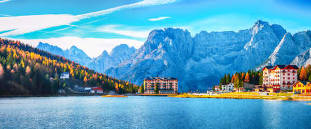 Fantastic sunny view of famous Misurina lake during autumn period. Location: Misurina lake, Dolomiti alps, Province of Belluno, Italy, Europeの写真素材