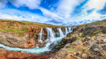 Charming view of Kolufossar waterfall at summer sunny day. Popular tourist travel destination in Iceland. Location: Kolufossar waterfall, Vestur-Hunavatnssysla, Iceland, Europeの写真素材