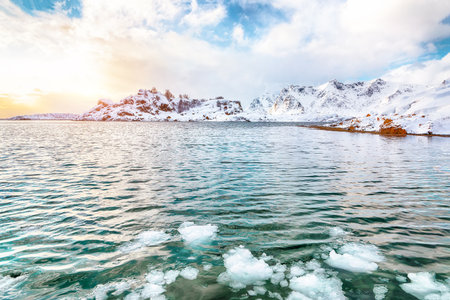 Fabulous winter scenery with lots of snow and snowy mountain peaks near Valberg. Location: Valberg, Vestvagoy, Lofotens, Norwayの写真素材
