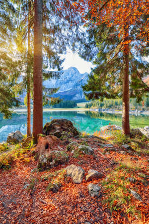 Astonishing view of Fusine lake with Mangart peak on background. Popular travel destination of Julian Alps. Location: Tarvisio comune, Province of Udine, Italy, Europeの写真素材