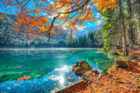 Breathtaking view of Fusine lake with Mangart peak on background. Popular travel destination of Mediterranean sea. Location: Tarvisio comune, Province of Udine, Italy, Europeの写真素材