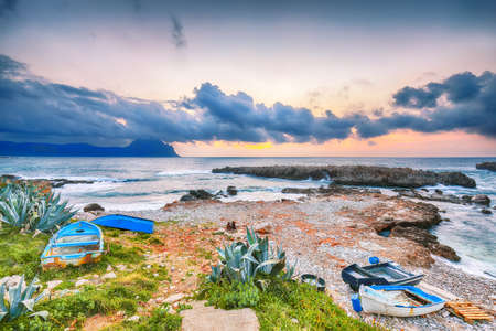 Breathtaking evening seascape of Isolidda Beach on San Vito cape. Popular travel destination of Mediterranean sea. Location: San Vito Lo Capo, Province of Trapani, Sicily, Italy, Europeの写真素材