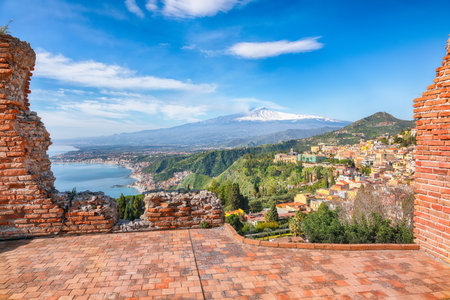 Awesome aquamarine blue waters of sea near Taormina resorts and Etna volcano mount. Giardini-Naxos bay, Ionian sea coast, Taormina, Sicily, Italy.の写真素材