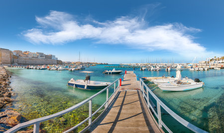 Breathtaking view on harbour of Otranto in Italy with lots of boats and yachts. Italian vacation. Town Otranto, province of Lecce in the Salento peninsula, Puglia, Italyの写真素材
