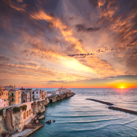 Vieste - beautiful coastal town on the rocks in Puglia. The church of San Francesco di Vieste. Gargano peninsula, Apulia, southern Italy, Europe.の写真素材