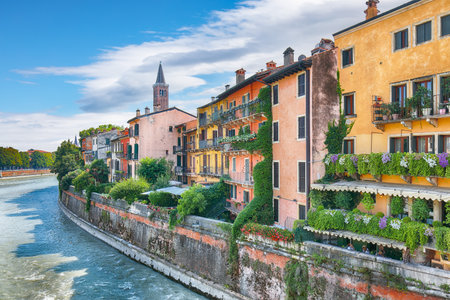 Amazing Verona cityscape view on the riverside with historical buildings and towers. Location: Verona, Veneto region, Italy, Europeの写真素材