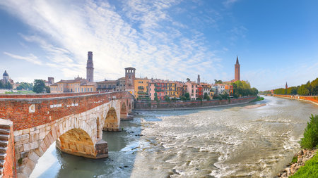 Amazing Verona cityscape view on the riverside with historical buildings ,bridges and towers. Location: Verona, Veneto region, Italy, Europeの写真素材