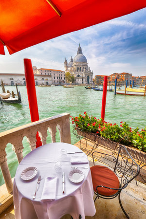 Breathtaking morning cityscape of Venice with famous Canal Grande and Basilica di Santa Maria della Salute church. Location: Venice, Veneto region, Italy, Europeの写真素材