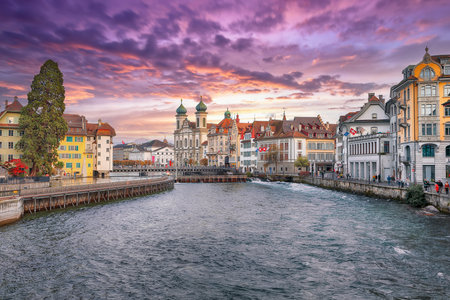 Amazing historic city center of Lucerne with famous buildings and lake Jesuitenkirche Church. Popular travel destination .  Location: Lucerne, Canton of Lucerne, Switzerland, Europeの写真素材