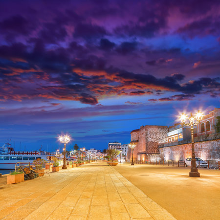 Unbelivable evening cityscape of historical part of Alghero town. Fantastic  Mediterranean seascape. Location:  Alghero, Province of Sassari, Italy, Europeの写真素材