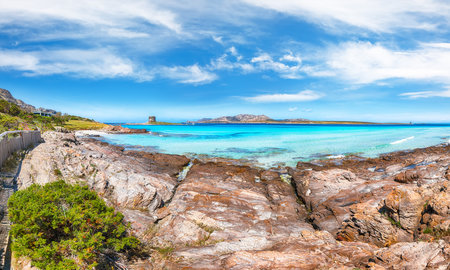 Unbelivable morning view of famous La Pelosa beach and rocky shore near Torre della Pelosa.  Location:  Stintino, Province of Sassari, Italy, Europeの写真素材