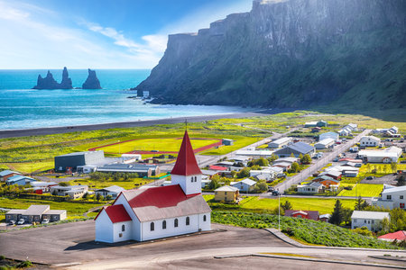 Ramarkable view of Vikurkirkja christian church. Scenic image of  popular tourist destination.
Location: Vik village in Myrdal Valley, Iceland, Europe.の写真素材