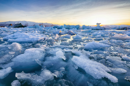 Ramarkable  landscape with floating icebergs in Jokulsarlon glacier lagoon at sunset. Location: Jokulsarlon glacial lagoon, Vatnajokull National Park, south Iceland, Europeの写真素材