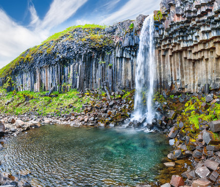 Impressive view of Svartifoss waterfall with basalt columns on southern part of Iceland.  Location:  Skaftafell National Park, Vatnajokull glacier, Iceland, Europe.の写真素材