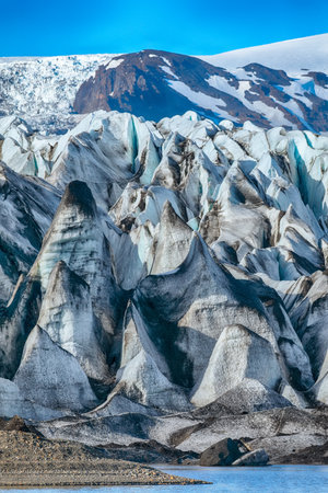 Impressive view of Skaftafellsjokull glacier tongue and volcanic mountains around on South Iceland. Location: Skaftafell National Park, Skaftafellsjokull glacier, Iceland, Europe.の写真素材
