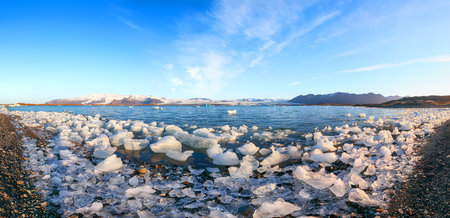 Ramarkable landscape with floating icebergs in Jokulsarlon glacier lagoon at sunset. Location: Jokulsarlon glacial lagoon, Vatnajokull National Park, south Iceland, Europeの写真素材