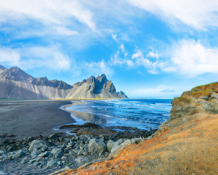 Amazing sunny day and dramatic black sand beach on Stokksnes cape in Iceland. Location: Stokksnes cape, Vestrahorn (Batman Mount), Iceland, Europe.の写真素材