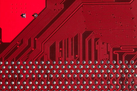 Macro shot of the backside of a computer circuit board or motherboard.の写真素材