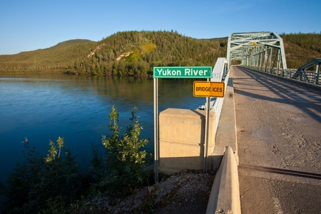 Yukon river bridge at Carmacks, Yukon T., Canadaの写真素材