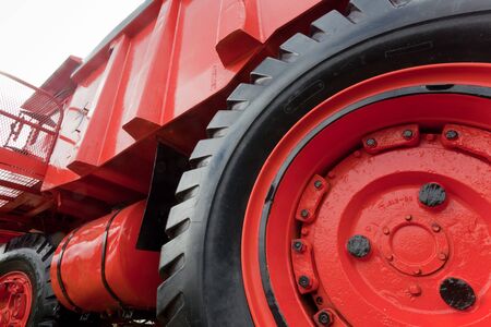 Enormous wheel, rim and tire, of vinatge giant mining truckの写真素材