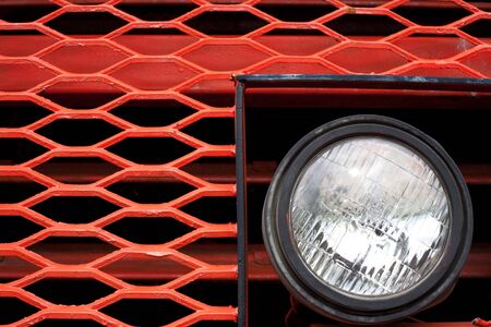 Head beam lamp and grill of vinatge giant mining truck.の写真素材