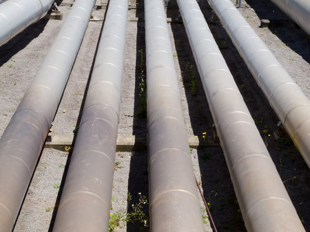 Background of a pipeline installation for distribution and supply of liquid and gaseous products,...