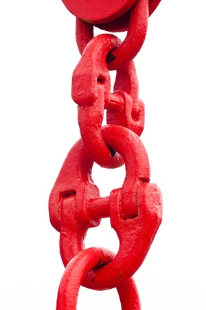 Close up shot of big painted red chain links isolated on white backgroundの写真素材