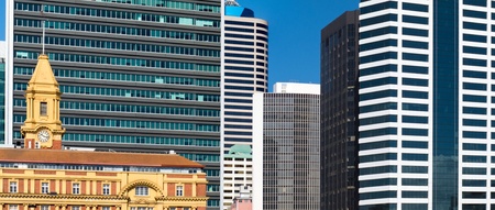 Dense high-riser buildings of Auckland, New Zealand, forming an abstract of modern architectureの写真素材