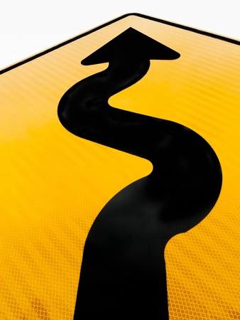 Wavy arrow on road sign pointing upward in a concept of achievement, advancement and successの写真素材