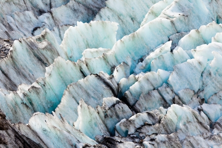 Blue turquoise glacier icefall frozen ice background texture patternの写真素材