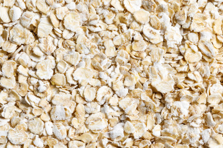 oat flakes raw food ingredient texture macro close up detailedの写真素材