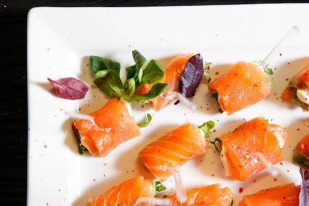 catering salmon basil canape white plateの写真素材