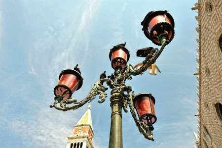 Old streetlight at the St. Mark's, square in Venice.の写真素材