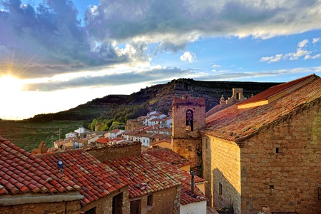 Landscape mountain view with small old town Ares in Spain  Sunset with very beautiful sky and clouds の写真素材