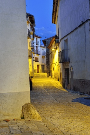 Streets of the old  town Ares in Spain   Evening time  Darkness with illumination の写真素材
