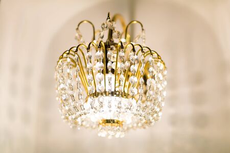 golden crystal chandelier, wall typeの写真素材