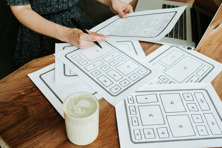 Woman designer create website design wireframe. Sketch, prototype, framework, layout future design...