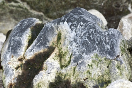 Beautiful stone with a wavy pattern on one of the Antarctic Strait.の写真素材