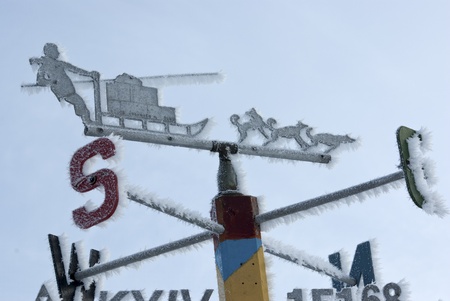 Signpost directions of the compass in the Antarctic winter.の写真素材
