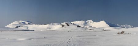 mountains and valleys of the central part of the Bering Island in winterの写真素材