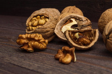 Handful of Walnuts on wooden background