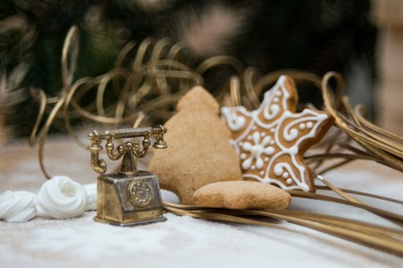 Christmas interior with a copper telephone and sweetsの写真素材