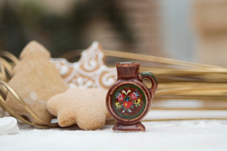 Christmas interior with a small ceramic jug and gingerbreadgsの写真素材