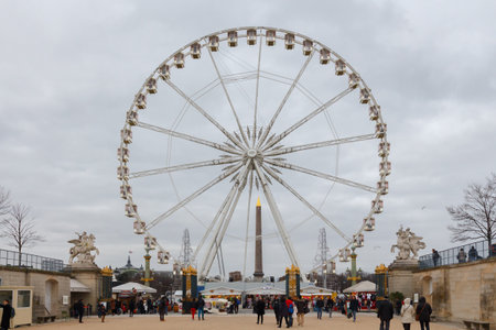 Paris, France - December 21, 2014: Ferris wheel at the Place de la Concorde. One of the most popular attractions of Paris.のeditorial素材